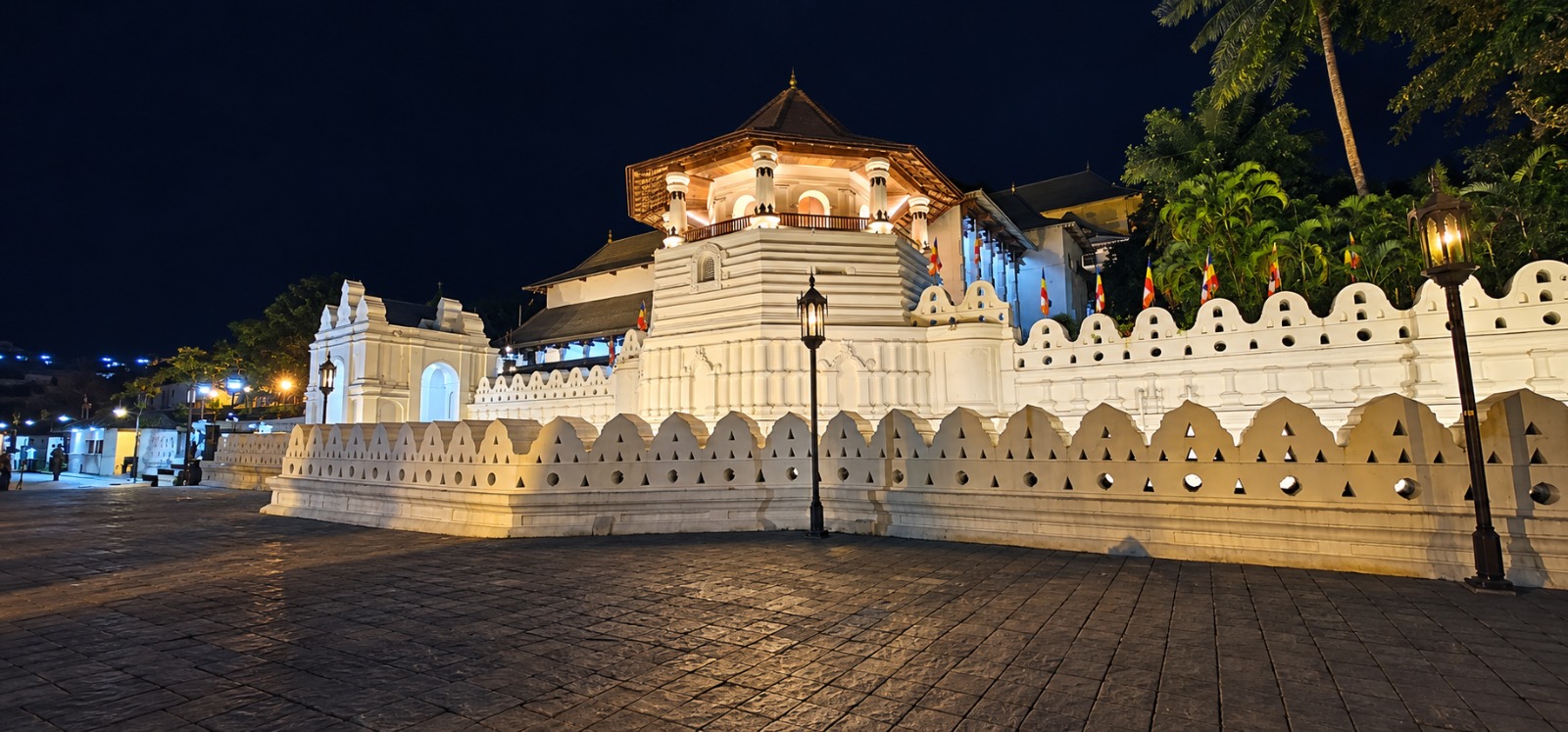 The Temple of the Tooth in Kandy, lit up at night